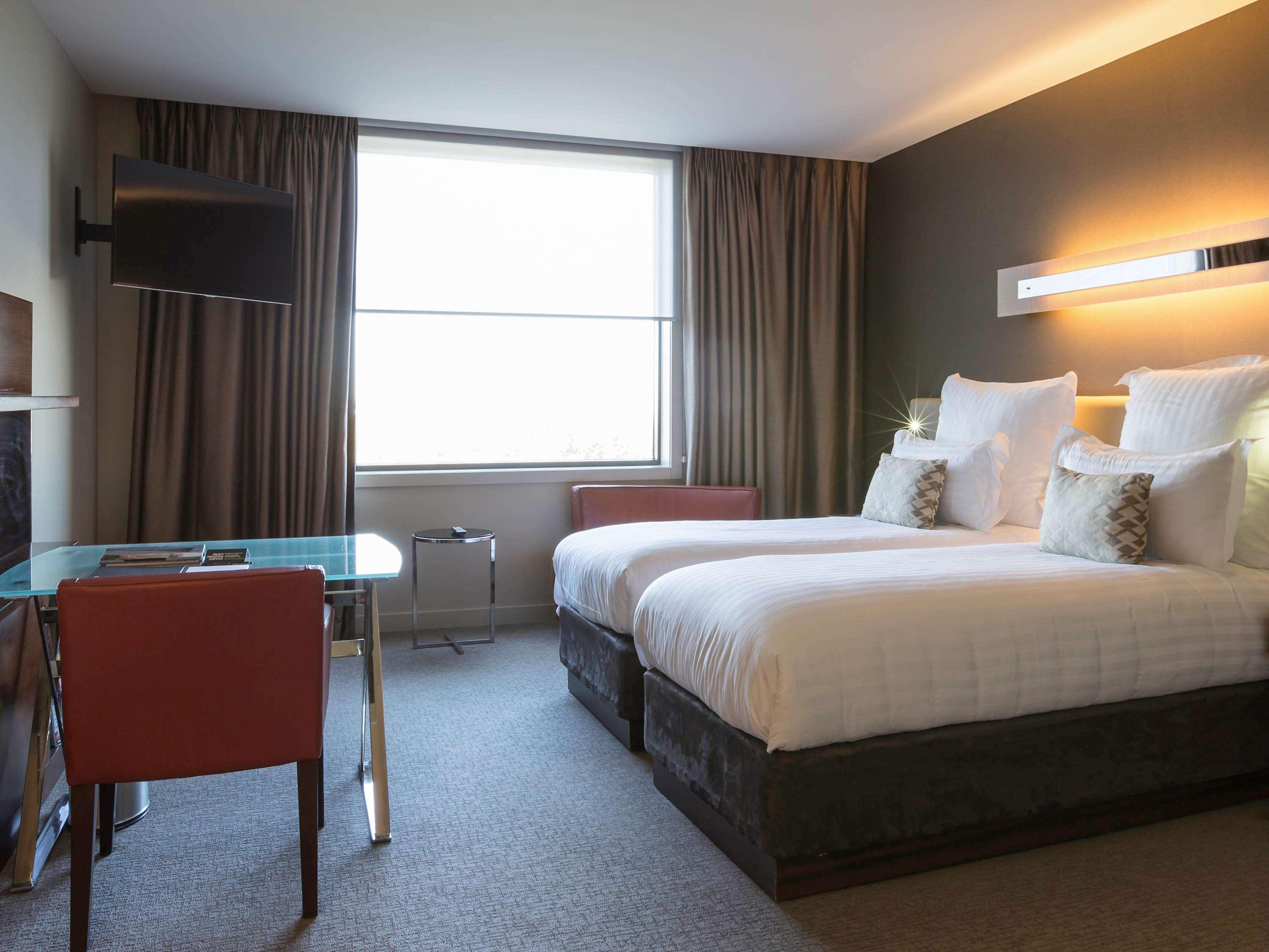 Pullman Sydney Olympic Park Sidney Exterior foto A room at the hotel