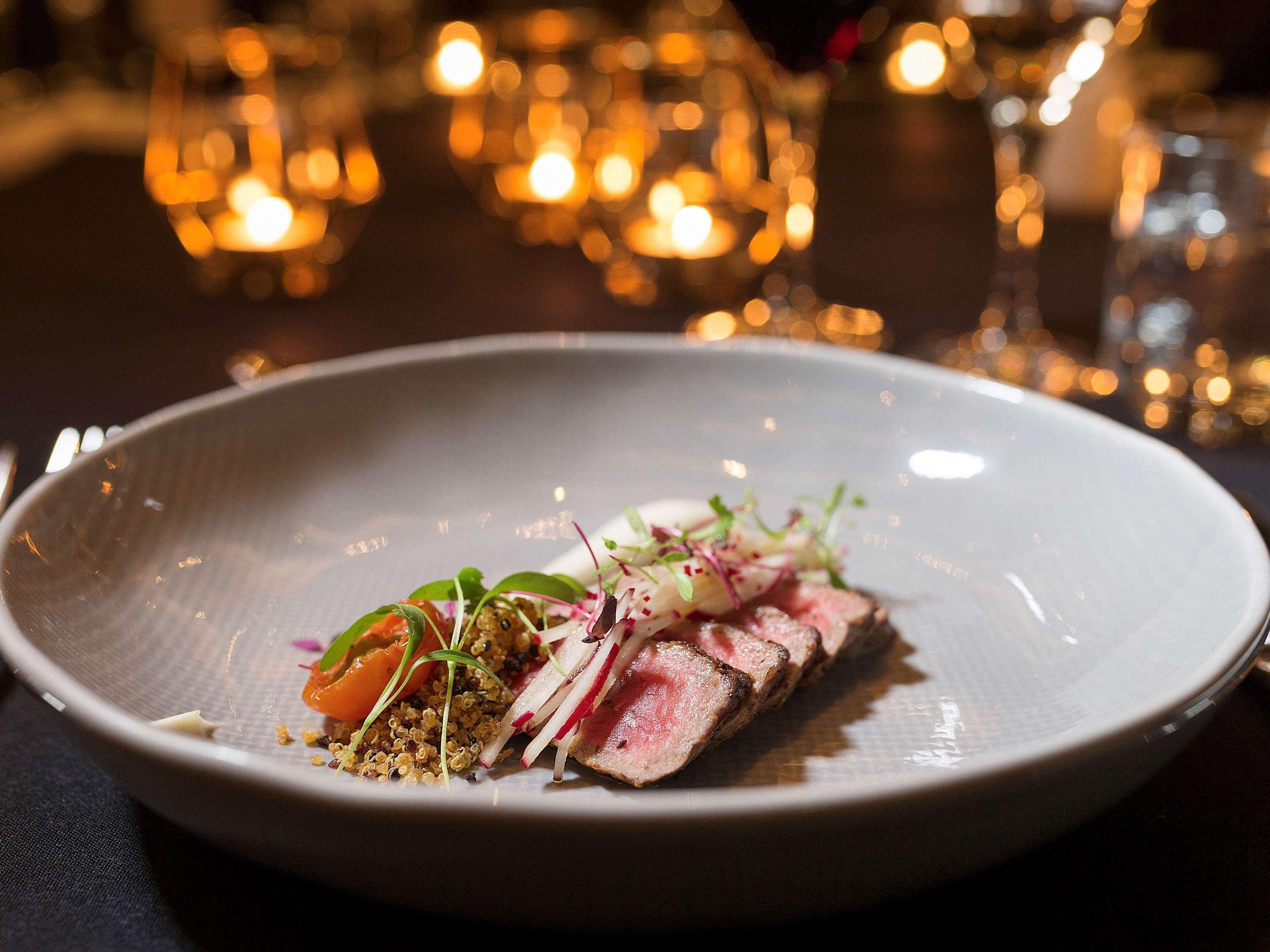 Pullman Sydney Olympic Park Sidney Exterior foto A dish at the restaurant