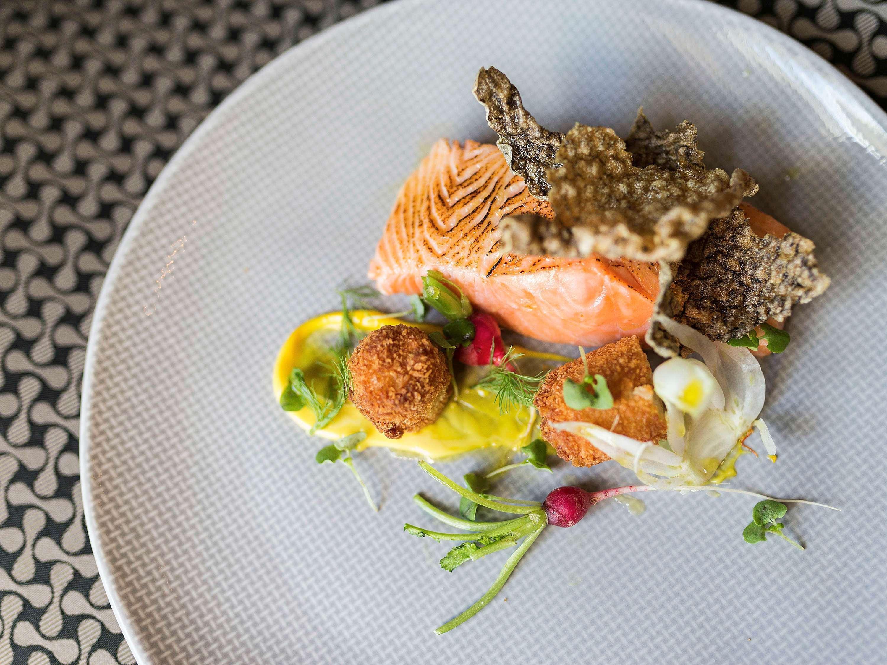 Pullman Sydney Olympic Park Sidney Exterior foto Salmon prepared with a sauce of white wine, mustard, and cream